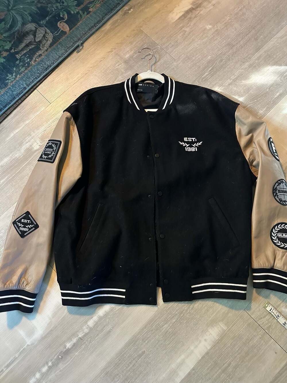 ASOS DESIGN Varsity Jacket with Patches and Faux Leather Sleeves